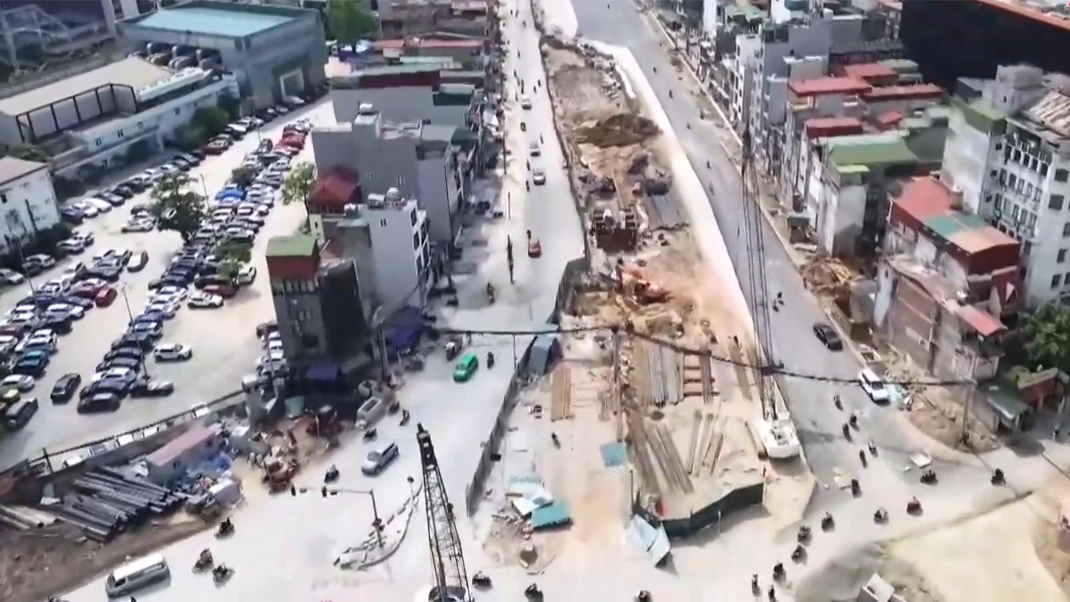 Thảm nhựa đường Vành đai 1 đoạn Hoàng Cầu – Voi Phục