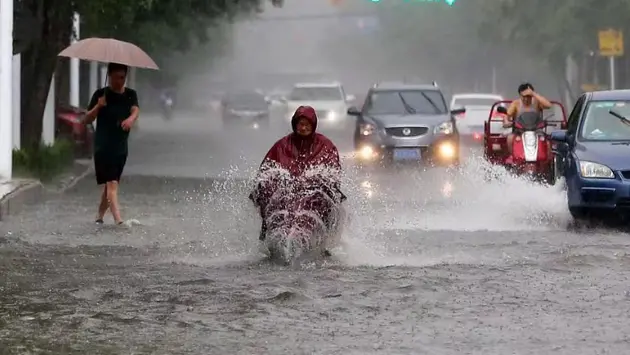 20.000 người Trung Quốc phải sơ tán do mưa lũ