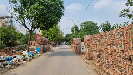 Vấn nạn bãi tập kết vật liệu xây dựng không phép
